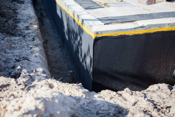 Professional Waterproofing technician working in Bancroft, WI